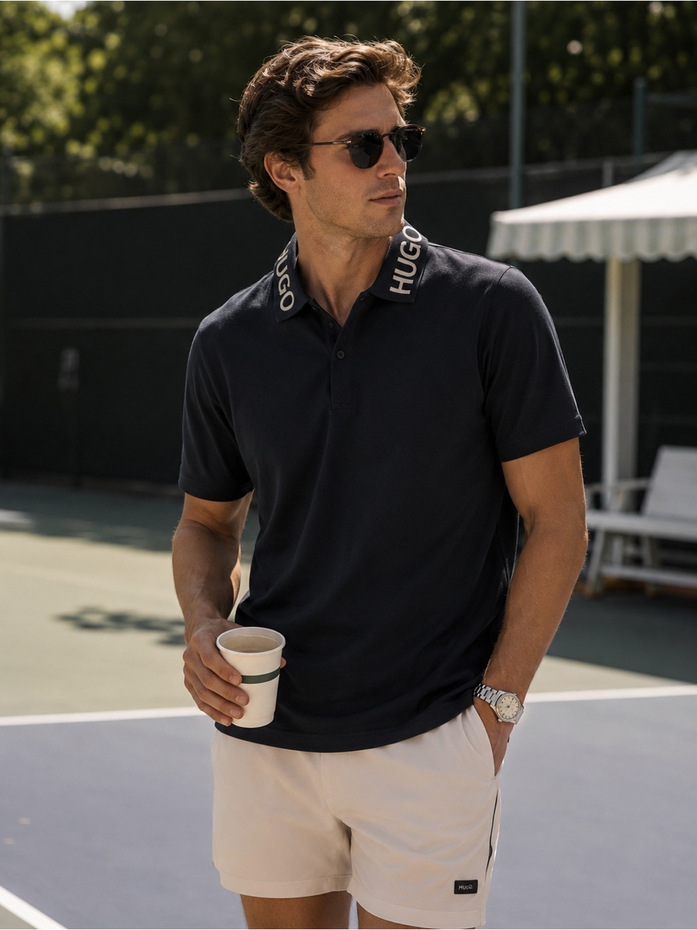 NWT Hugo Boss stretch polo with logo collar 3 button placket closure. Size Large